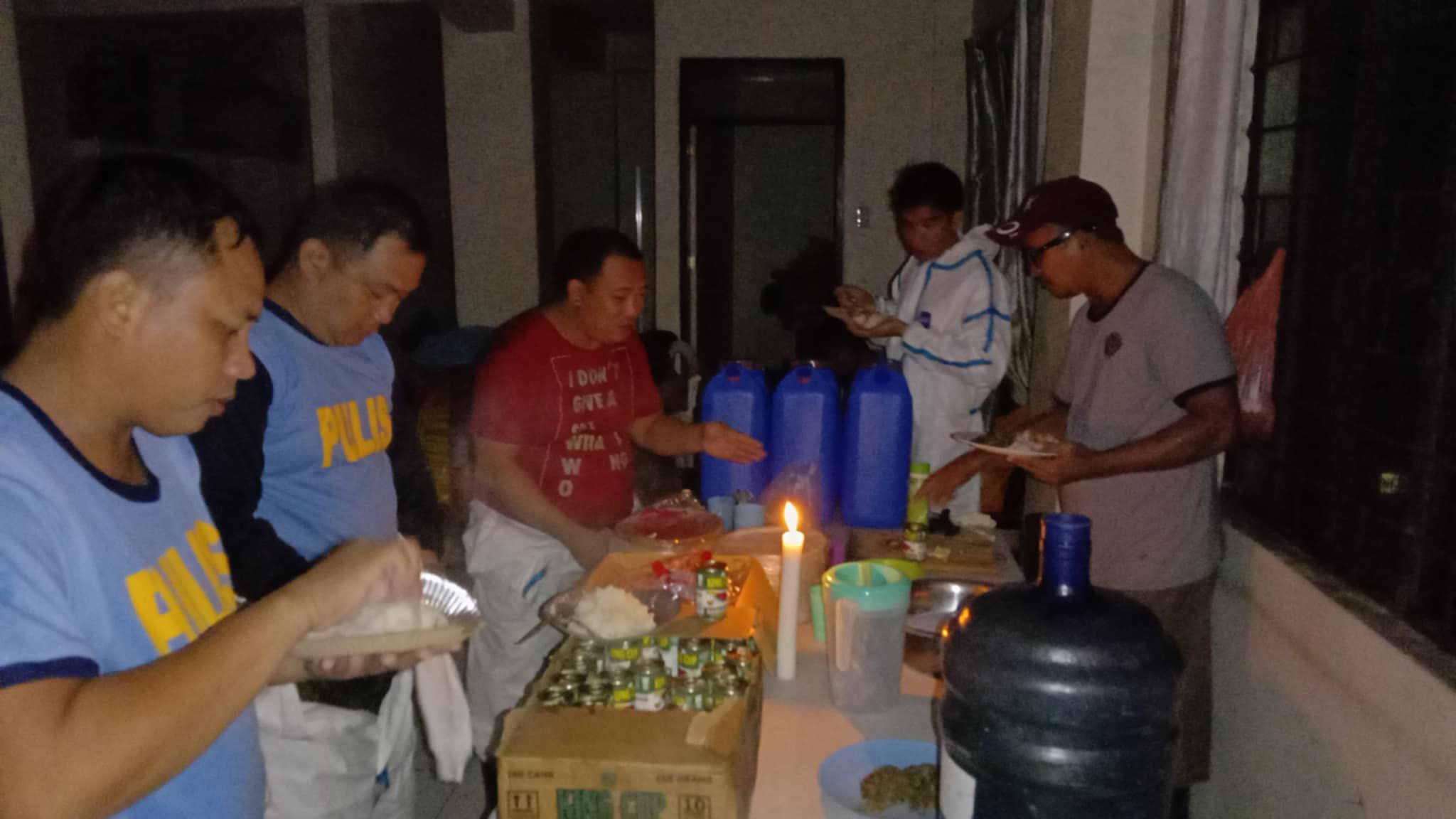 Volunteers preparing meals at an evacuation center